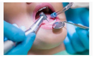 Meniere's disease caused by dental work - image of a dental surgery taking place 